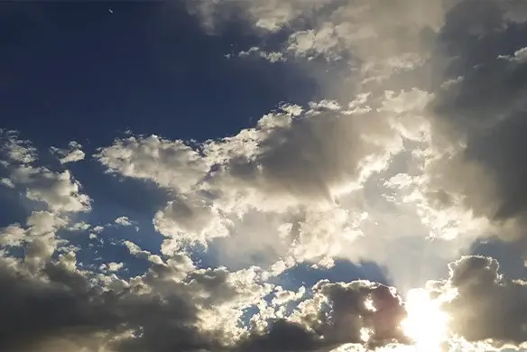 sun peeking through clouds