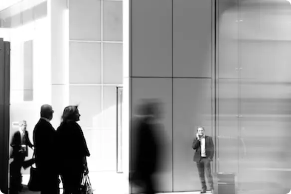 business people walking with motion blur