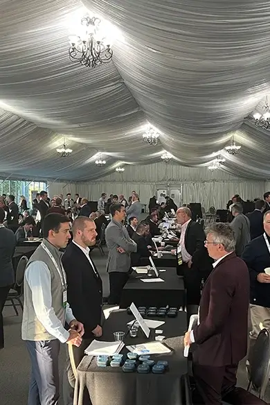 attendees mingle at the deal market during the M&A Source fall 2022 Conference