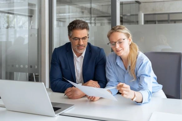 business professionals reviewing data